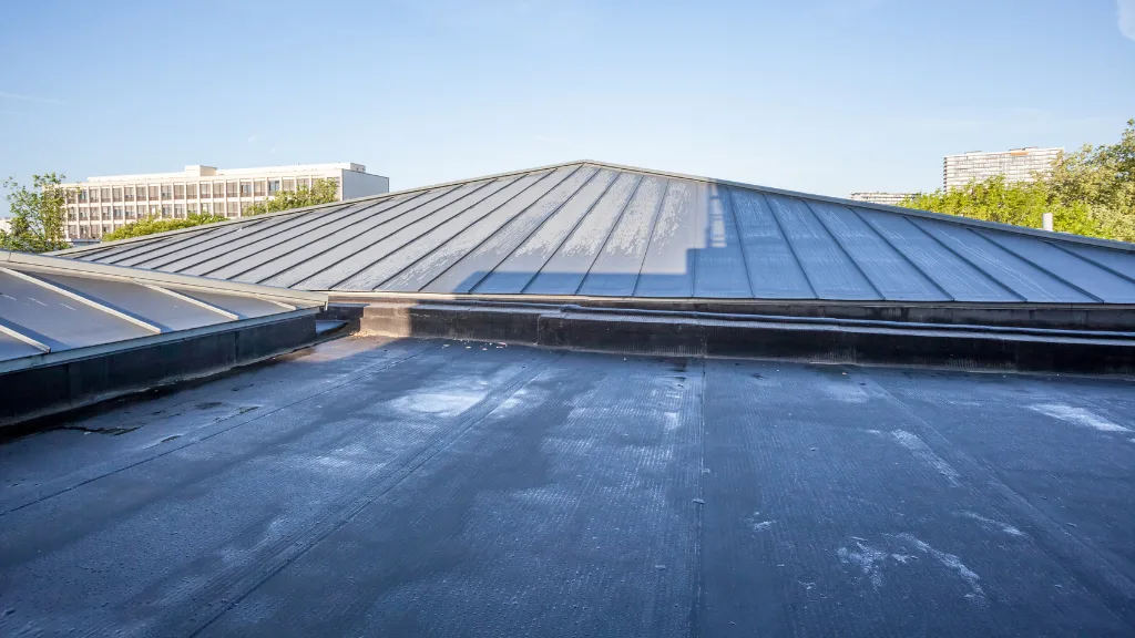 the best flat roof materials cost pros and cons